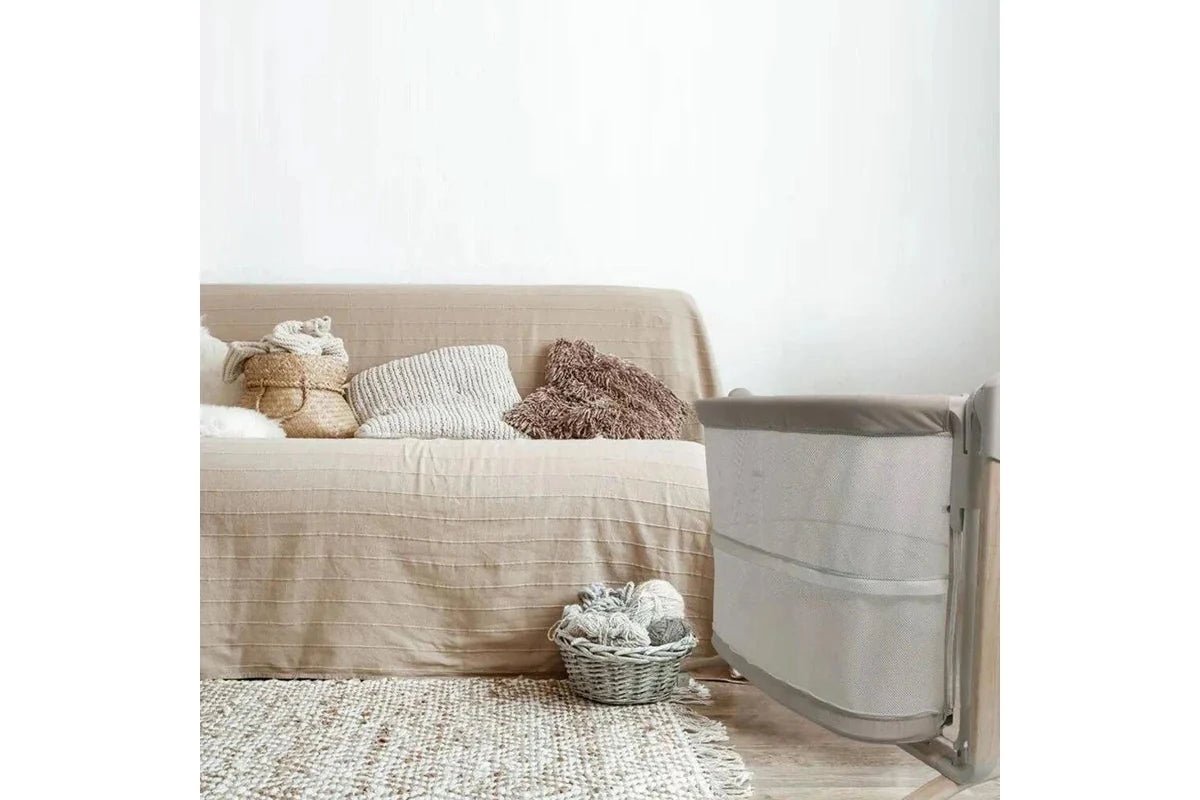 Baby Studio Baby Rockabye Bedside Sleeper Soothing Bassinet w/ Wheels 0-12m